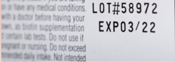 Lot number and expiry date on a dietary supplements label.
