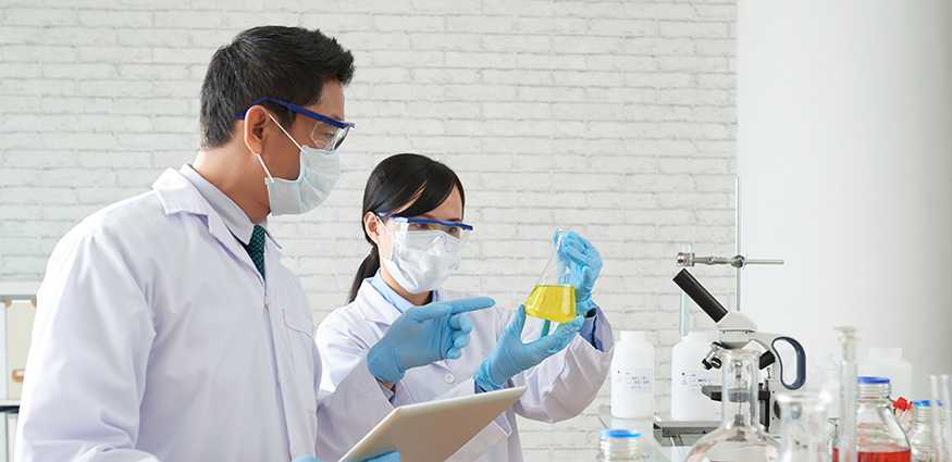 lab scientists experimenting in a Canadian analytical laboratory