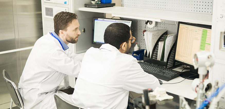 Scientist analyzing data in a Canadian analytical laboratory. 