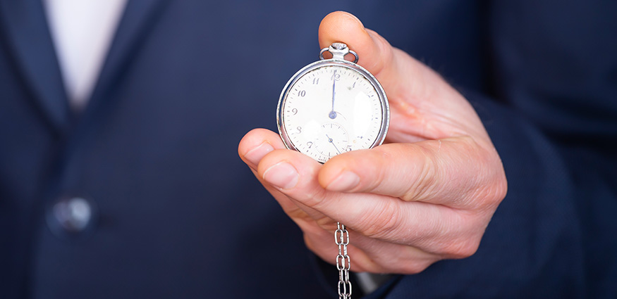 Man holding a stopwatch. Cannabis marijuana testing labs in Canada.